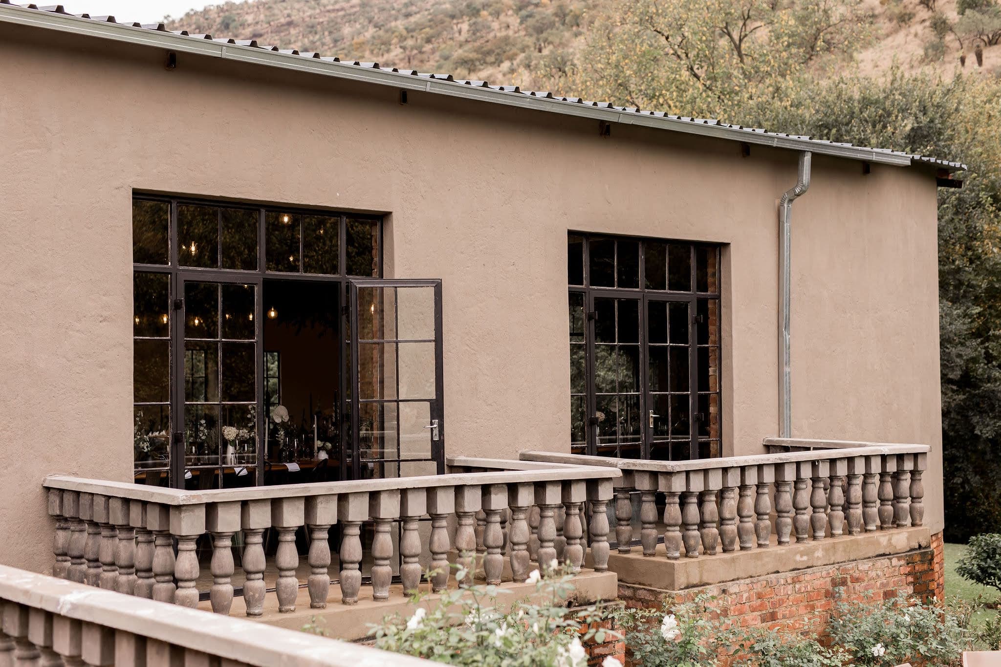 Intimate wedding couple outside chapel steps at Ever Be Wedding Venue Centurion