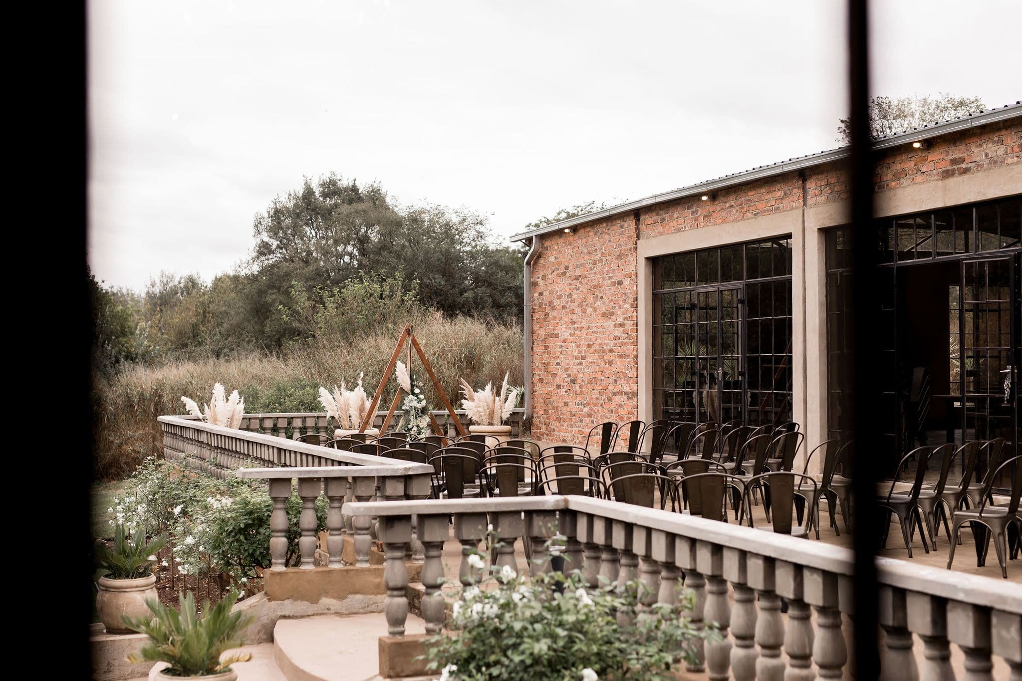Intimate wedding reception table decor in chapel at Ever Be Wedding Venue